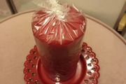 Red pillar candle &amp; plate