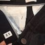 Selection of men's branded chinos Image 3