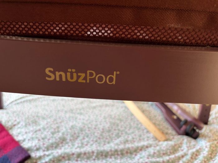 Snuzpod burgundy next to me crib