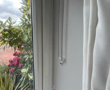3 Charcoal grey roller blinds