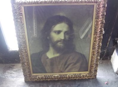 a large vintage holy picture in a lovely gild  frame