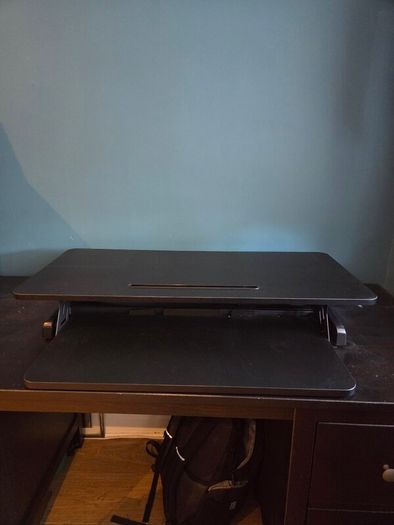 Hydraulic sitting/standing desk