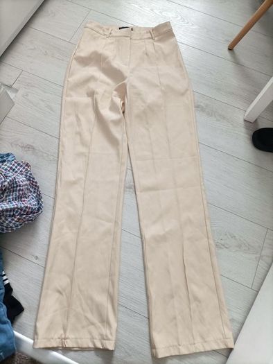 Cream flare trousers size 10