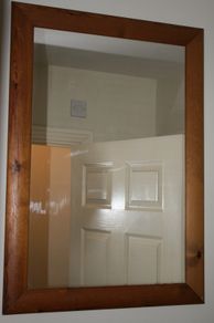 Mirror in a wooden frame (88cm x 63cm)