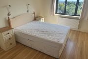 double bed and 2 side lockers
