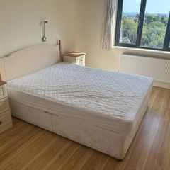 double bed and 2 side lockers