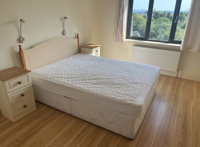 double bed and 2 side lockers