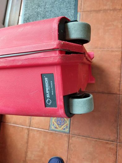 Red hard-shell suitcase