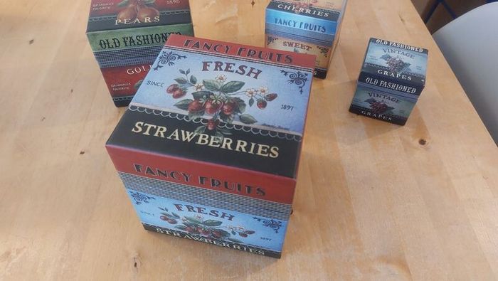 Fabulous Set of Four Graduated Stackable Nesting Storage Boxes by Quality Manufacturer Bob's Boxes/Lang Paper Co. with "Fancy Fruits" Artwork by Kimberly Poloson