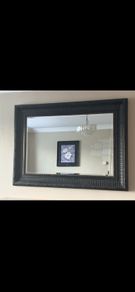 Black rectangle mirror with gold stud detail