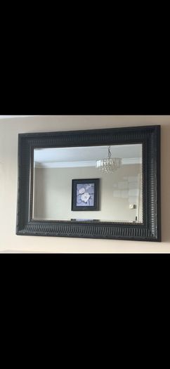 Black rectangle mirror with gold stud detail