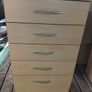5-drawer chest of drawers in a light wood. Image 3