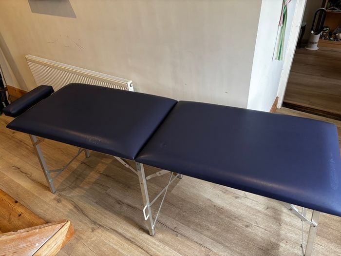 Massage table