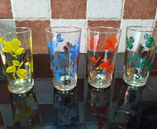 Vintage 1950's multicoloured and gold gilt glasses.