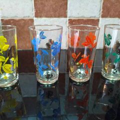 Vintage 1950's multicoloured and gold gilt glasses.