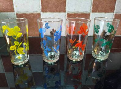 Vintage 1950's multicoloured and gold gilt glasses.
