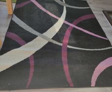 rug black with pink purple barely used