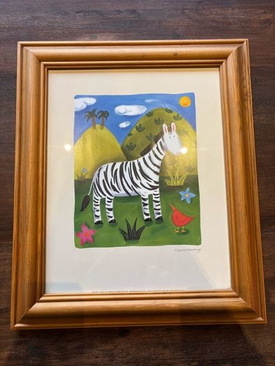 Framed art print titled 'Zara the Zebra' by Sophie Harding.