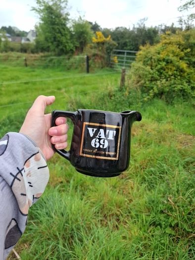 VAT 69 whiskey pitcher postage possible