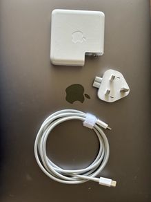 Apple 87 watt USB-C power adapter new plug and cable.
