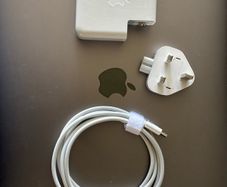 Apple 87 watt USB-C power adapter new plug and cable.