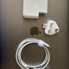 Apple 87 watt USB-C power adapter new plug and cable.