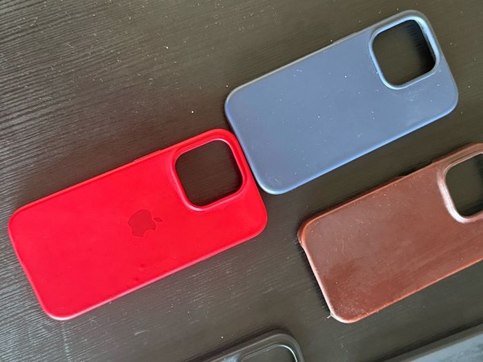 Bundle of 5 iPhone 14 Pro cases silicone and leather