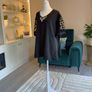 Ladies Black Short-sleeve Top Features Sheer polka-dot mesh sleeves Image 10