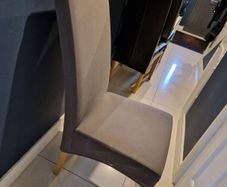 6 leather chairs with grey washable covers