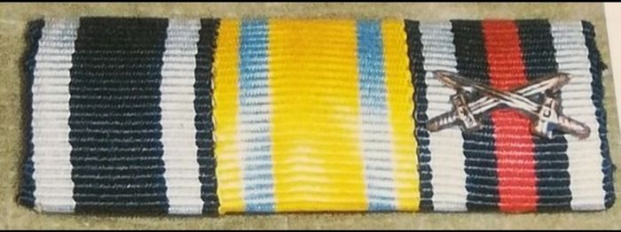World War I German military ribbon bar featuring three distinct awards
