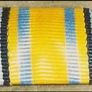 Original World War I German military ribbon bar featuring three distinct awards Image 2