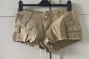 mini shorts with studded pocket and distressed hem