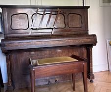 Upright piano and stool