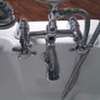 Corner bath with Panelling and Avondale Taps Image 9