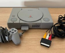 PlayStation console, Dual Shock controller, and all cables