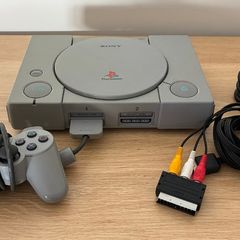 PlayStation console, Dual Shock controller, and all cables