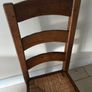 Set of 6 wooden dining chairs with rush seats Image 2