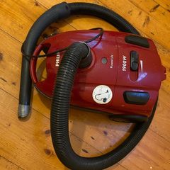 Small handy hoover with retractable flex cord