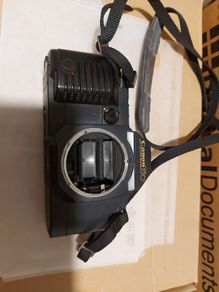 2 Vintage film Cameras, Canon and Praktica, being sold for parts or repair