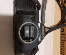2 Vintage film Cameras, Canon and Praktica, being sold for parts or repair