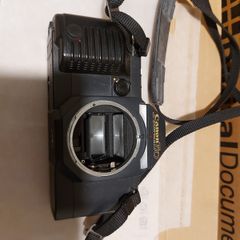2 Vintage film Cameras, Canon and Praktica, being sold for parts or repair