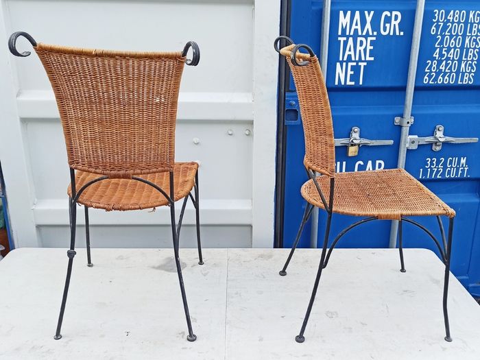 Two vintage wicker and wrought iron chairs