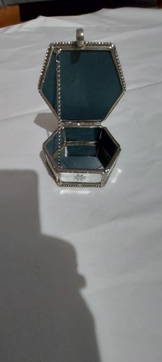 Lovely jewellery box ,,with bevelled mirrors sides and design, see pictures for condition,,take as is ,buyer collects or pays postage thank you
