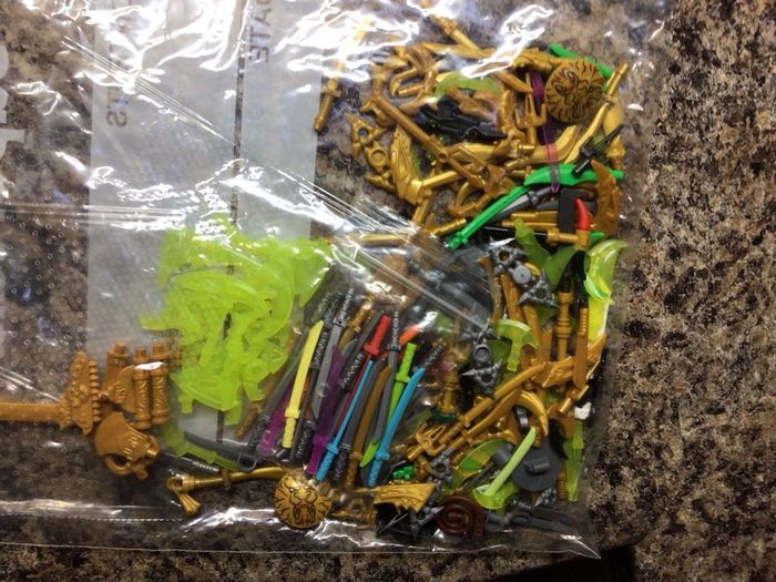 Mix bag of Lego weapons /swords