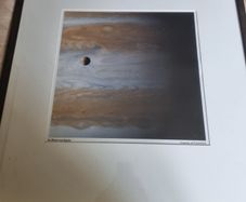The famous NASA photograph titled "Io Moon over Jupiter"