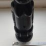 Vintage miniature "VUDU" bottle made of opaque black glass. Image 4