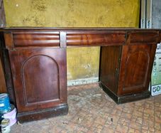 Georgian or Regency period mahogany side board with wine racks
