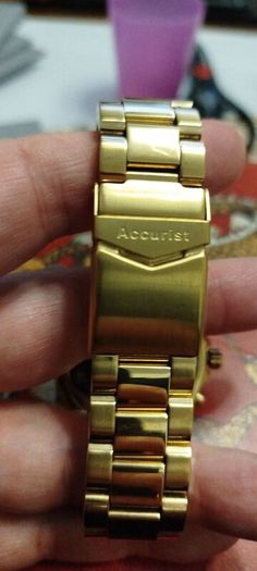 accurist mems gold tone watch