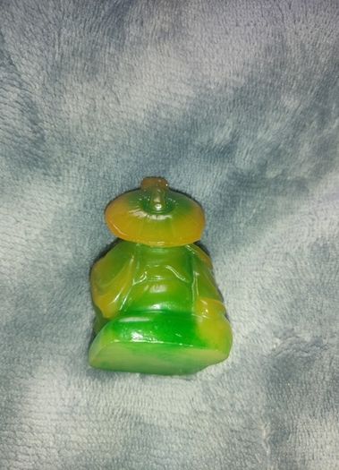 two inch high green Buddha