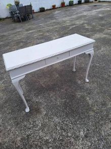 Vintage white painted console table in need of restoration